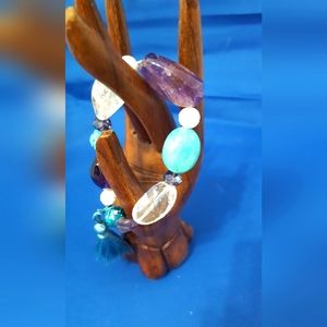 Beach bracelet with turquoise, amethyst and crystal beads, plus tassel.